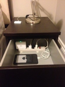 A picture of a nightside drawer used to hide cords