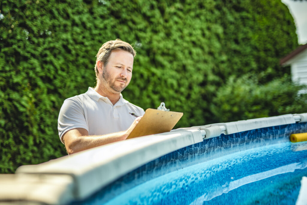 Kansas City electrician inspecting pool for electrical safety