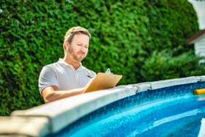 Kansas City electrician inspecting pool for electrical safety